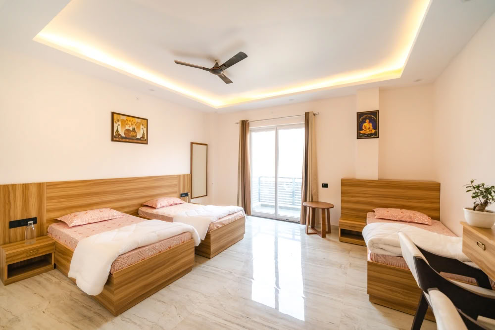 Habitación triple compartida (Alojamiento premium)
