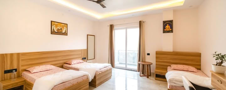 Habitación triple compartida (Alojamiento premium)