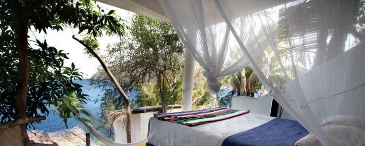 Suite de ocupación individual con 1 cama Queen, al aire libre, vista al mar